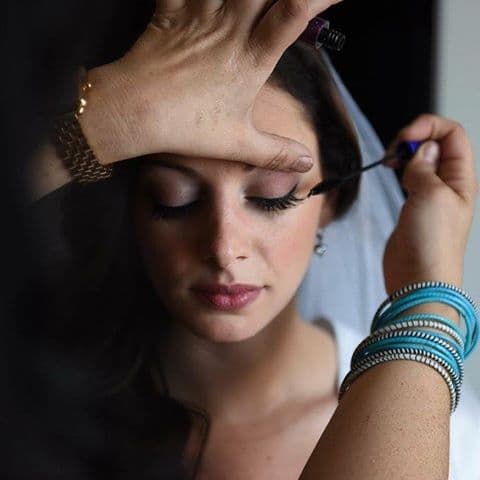 Mascara being applied to a client, close up